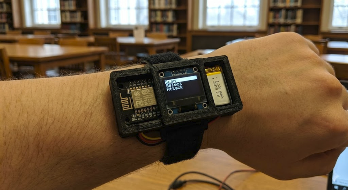 DIY ESP32 deauther wristwatch for Wi-Fi testing (device on wrist)