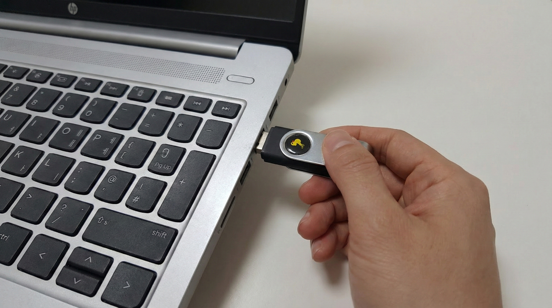 USB Rubber Ducky plugged into a laptop for HID keyboard injection (deployment example)